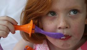 Groovy gripper fork and spoon accessory